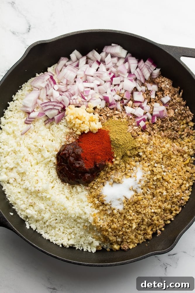 The Ultimate Vegan Taco Filling 4 pan full of ingredients to make vegan taco meat