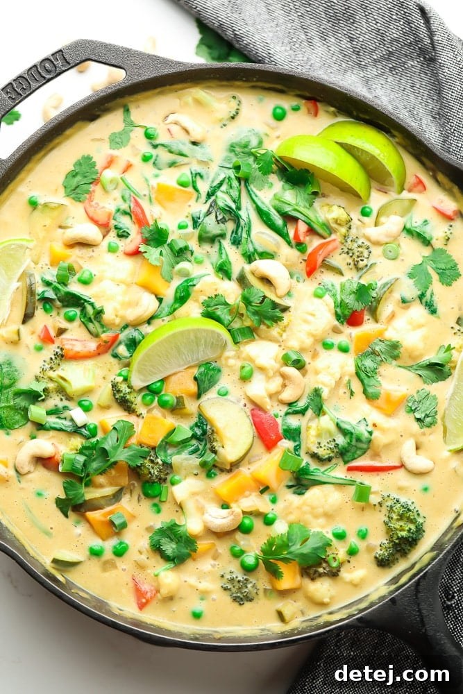 Vibrant Vegan Thai Green Curry 2 vegan thai green curry in a pan with lime slices