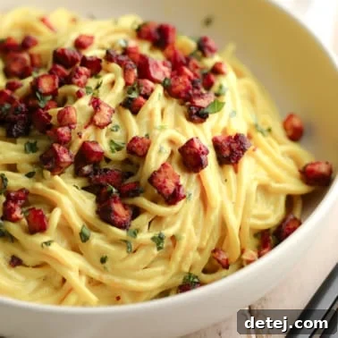 square image of a bowl of vegan carbonara with tofu bacon