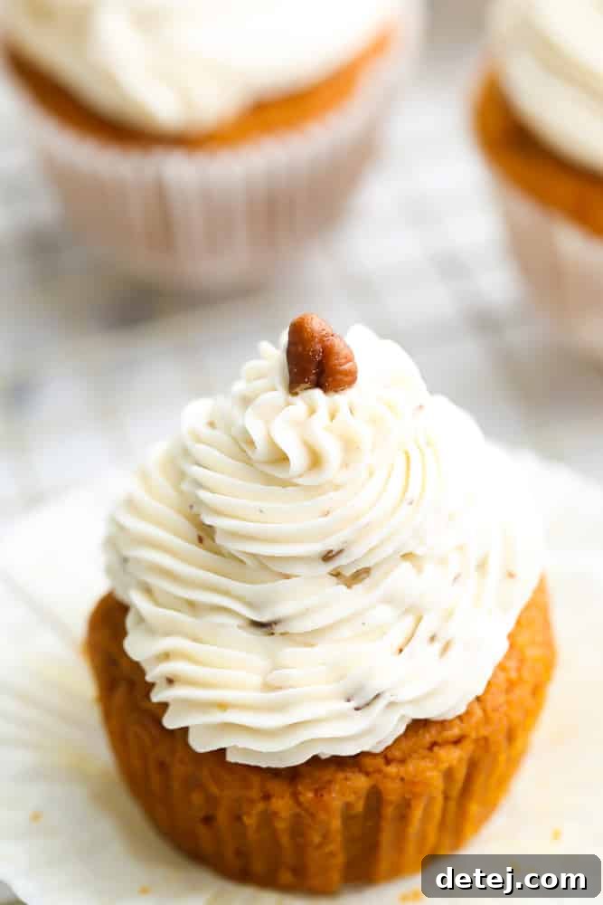 close up of frosting on vegan pumpkin cupcake