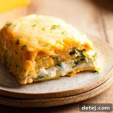 Close up on a slice of vegan butternut squash lasagna on a plate.