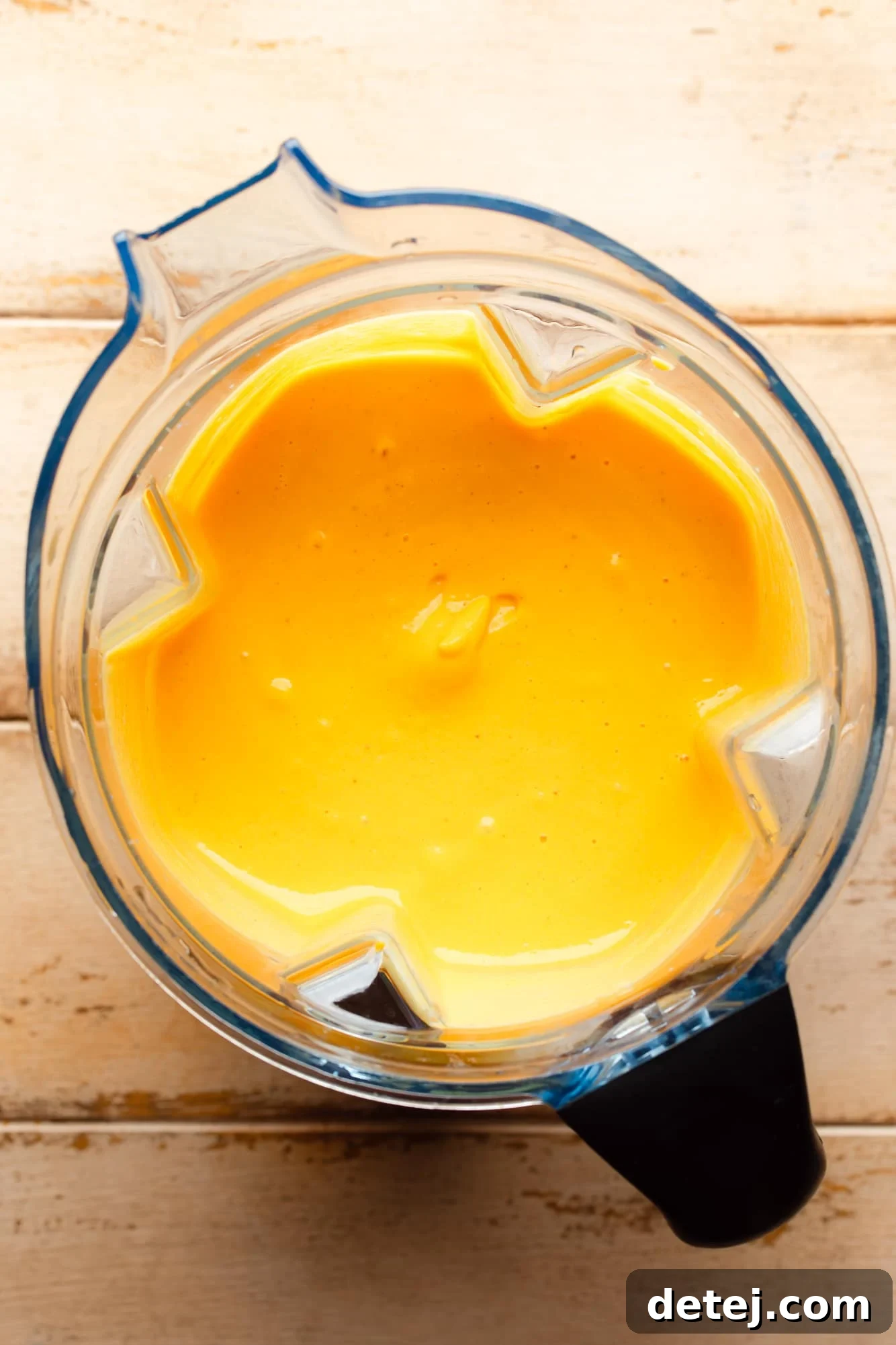 Smooth and creamy blended butternut squash sauce in a blender jar.