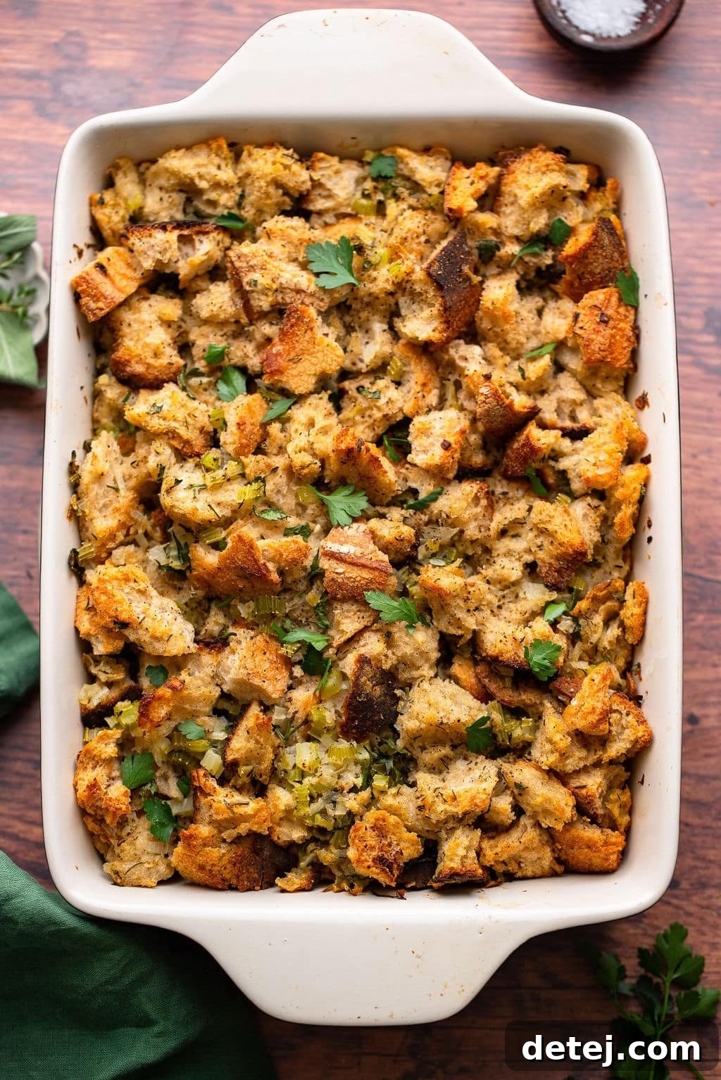 Ultimate Vegan Stuffing 10 Perfectly baked, golden-brown vegan stuffing in a casserole dish, with a crisp, inviting top layer.