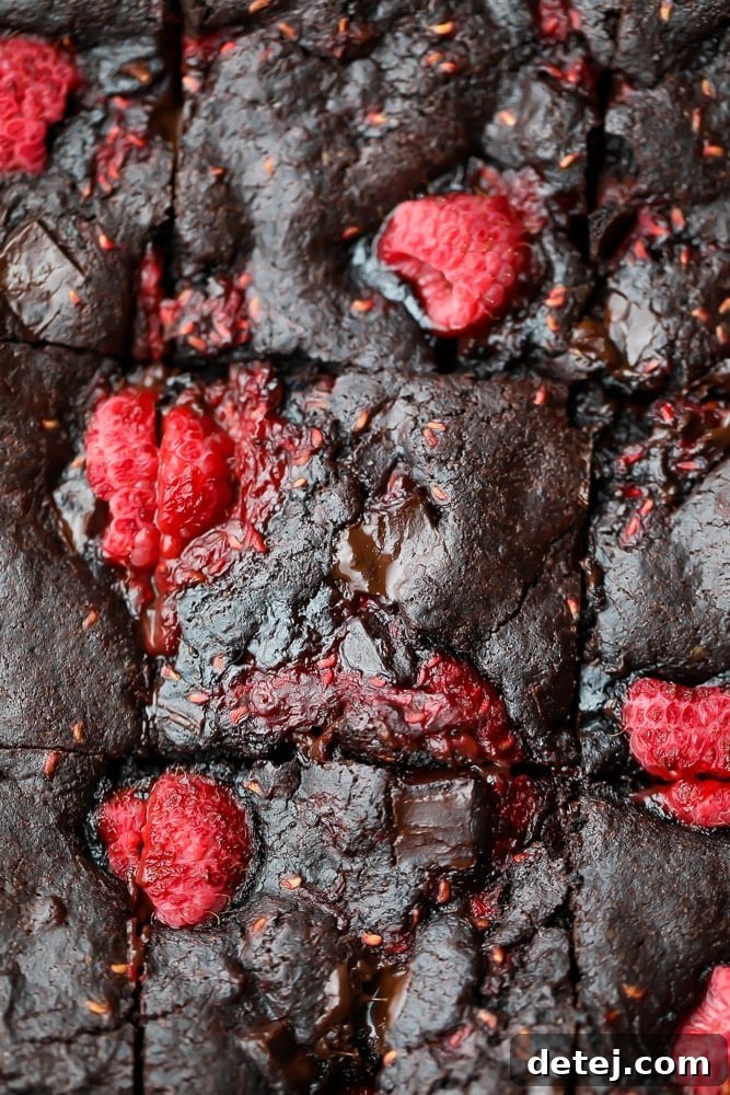 close up of raspberry brownies from top down