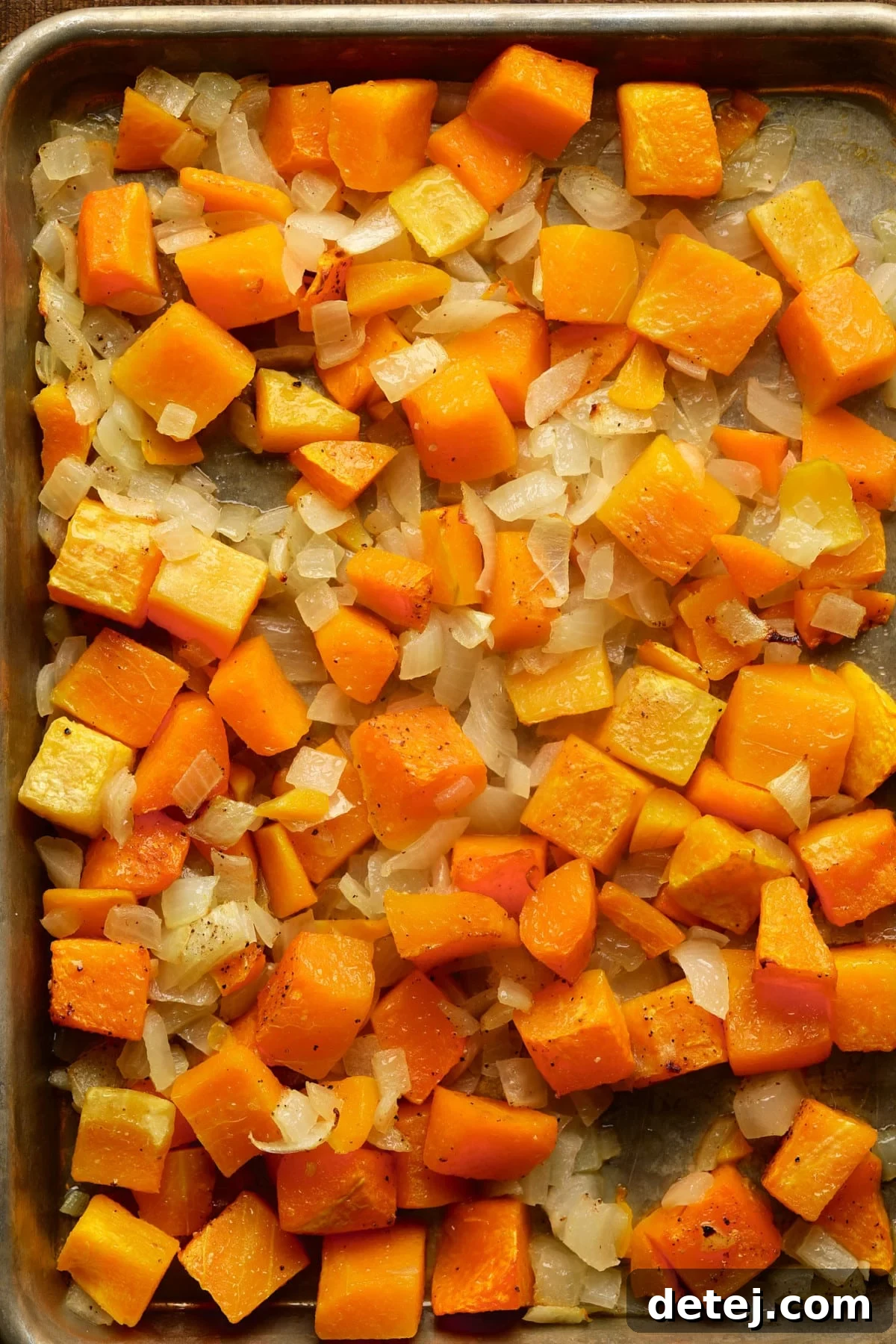 Velvety Butternut Pasta Sauce 3 roasted squash and onions on a baking sheet