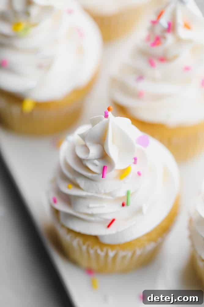 looking down on a couple of cupcakes with sprinkles