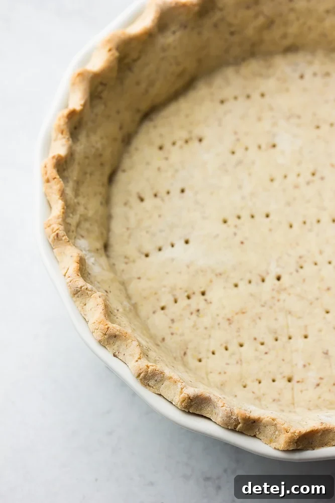 Close-up image of a perfectly cooked healthy pie crust, showing its delicate texture and golden-brown finish.