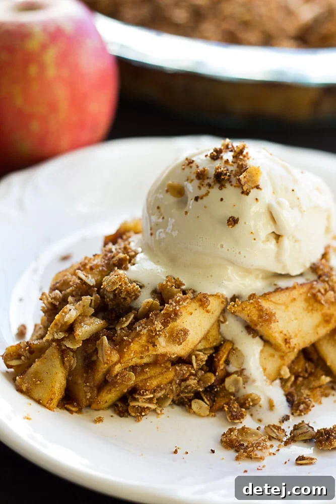 Gluten Free Vegan Apple Crumble Pie: Made with an almond flour crust, minimal oil, and full of sticky sweet apples with a perfect crumble topping.