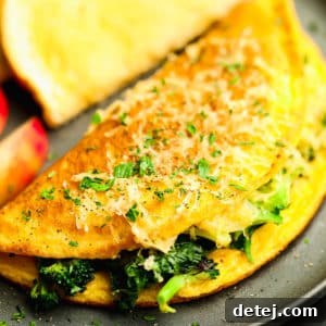 Close up on a cooked vegan omelette on a grey plate