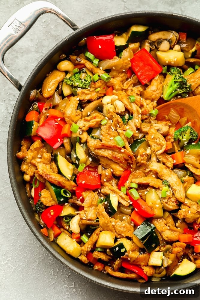 large skillet with cooked vegetable stir fry and soy curls