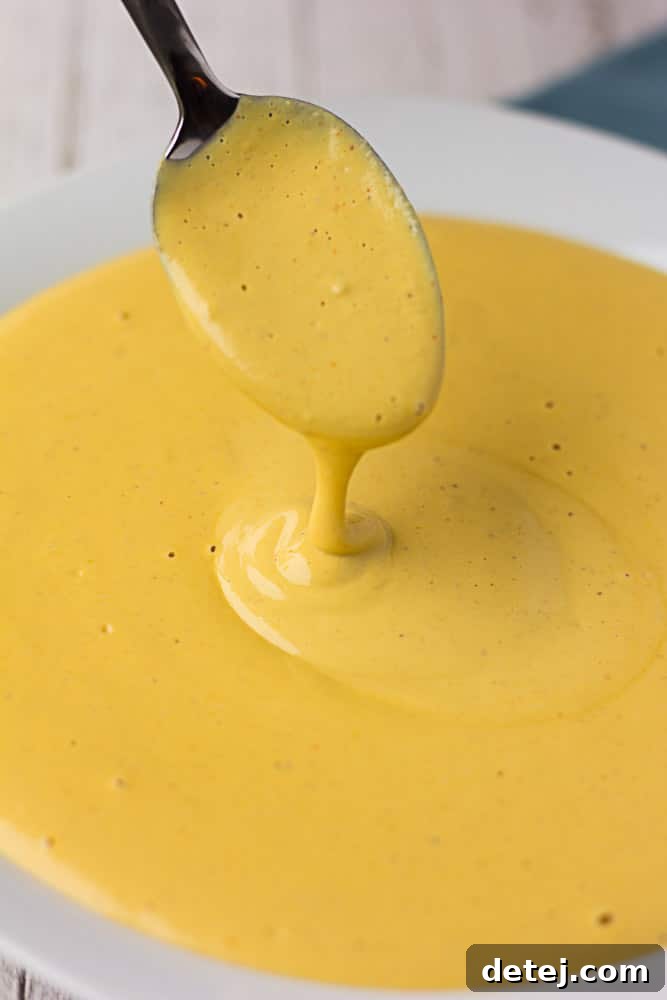 Easy Vegan Nacho Cheese Sauce: Made with cashews, this vegan nacho cheese sauce is a cinch to make, healthy and kid-friendly!