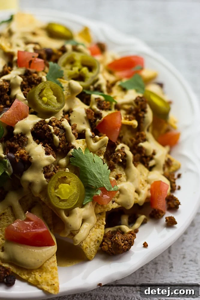 Easy Vegan Nacho Cheese Sauce: Made with cashews, this vegan nacho cheese sauce is a cinch to make, healthy and kid-friendly!