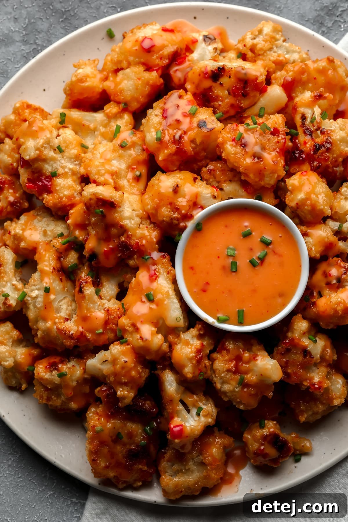 lots of bang bang cauliflower on a plate