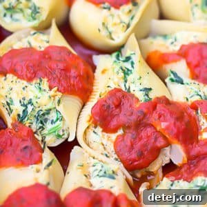 square image of stuffed shells in dish