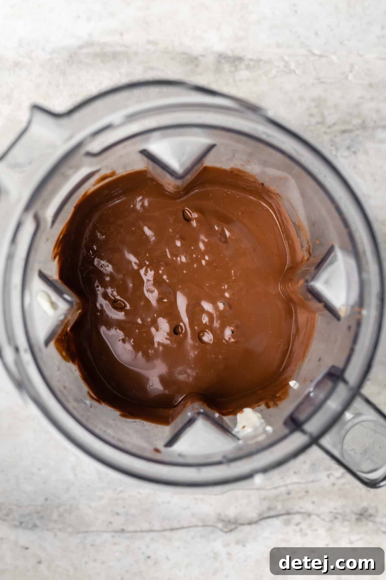 Velvet Vegan Chocolate Indulgence 6 a melted chocolate mixture in a blender.