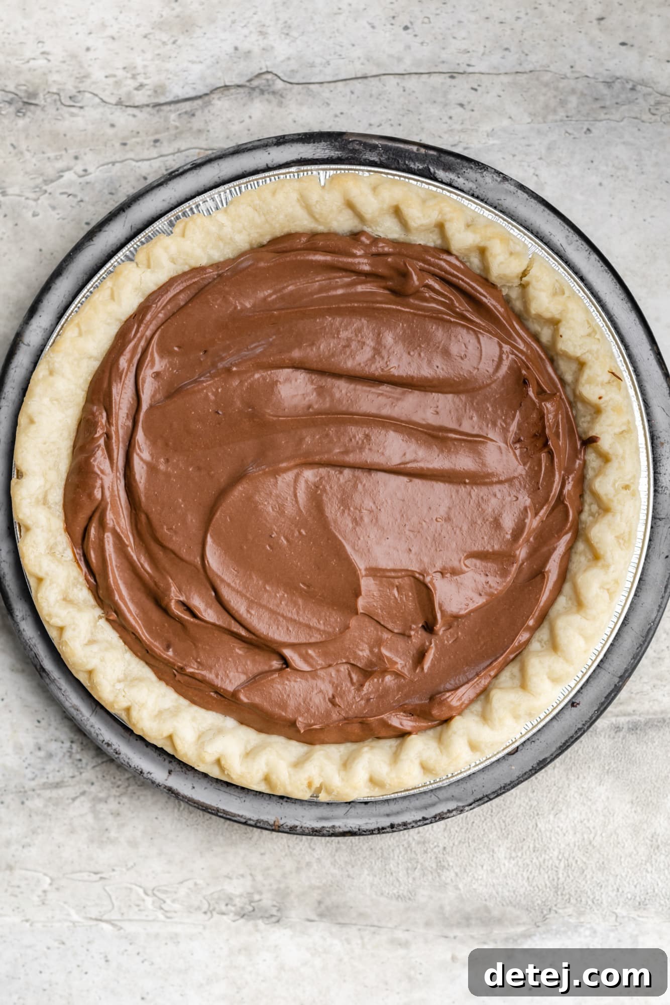 Velvet Vegan Chocolate Indulgence 7 a smooth chocolate mixture in a baked pie shell.