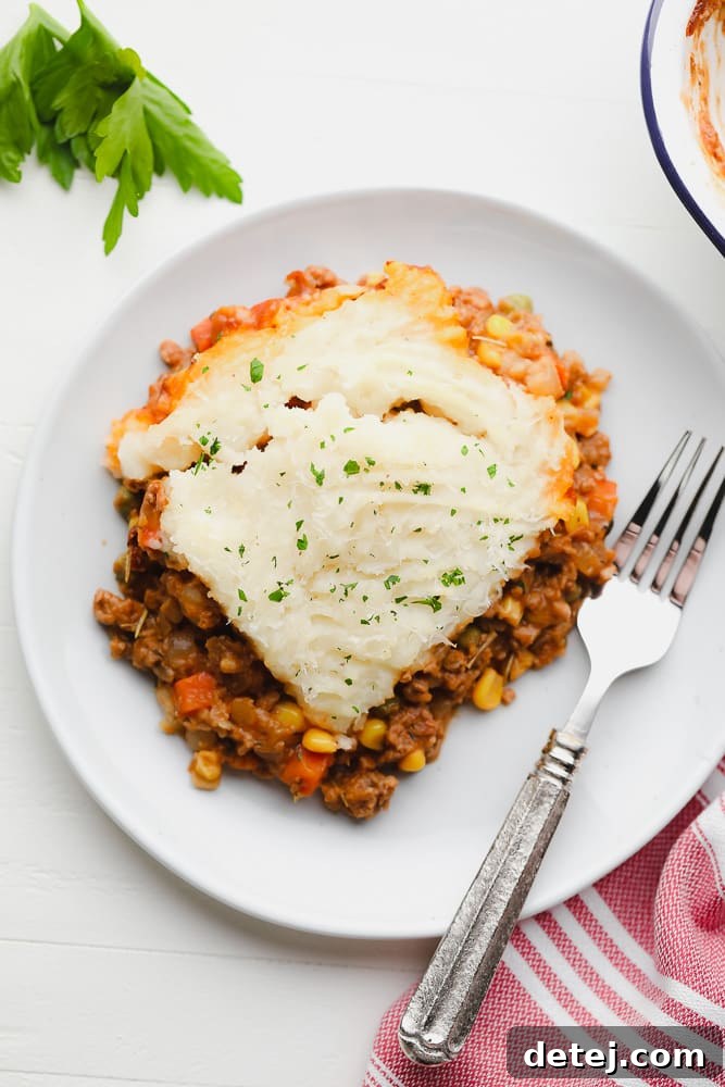 white plate with vegan shepherd's pie square
