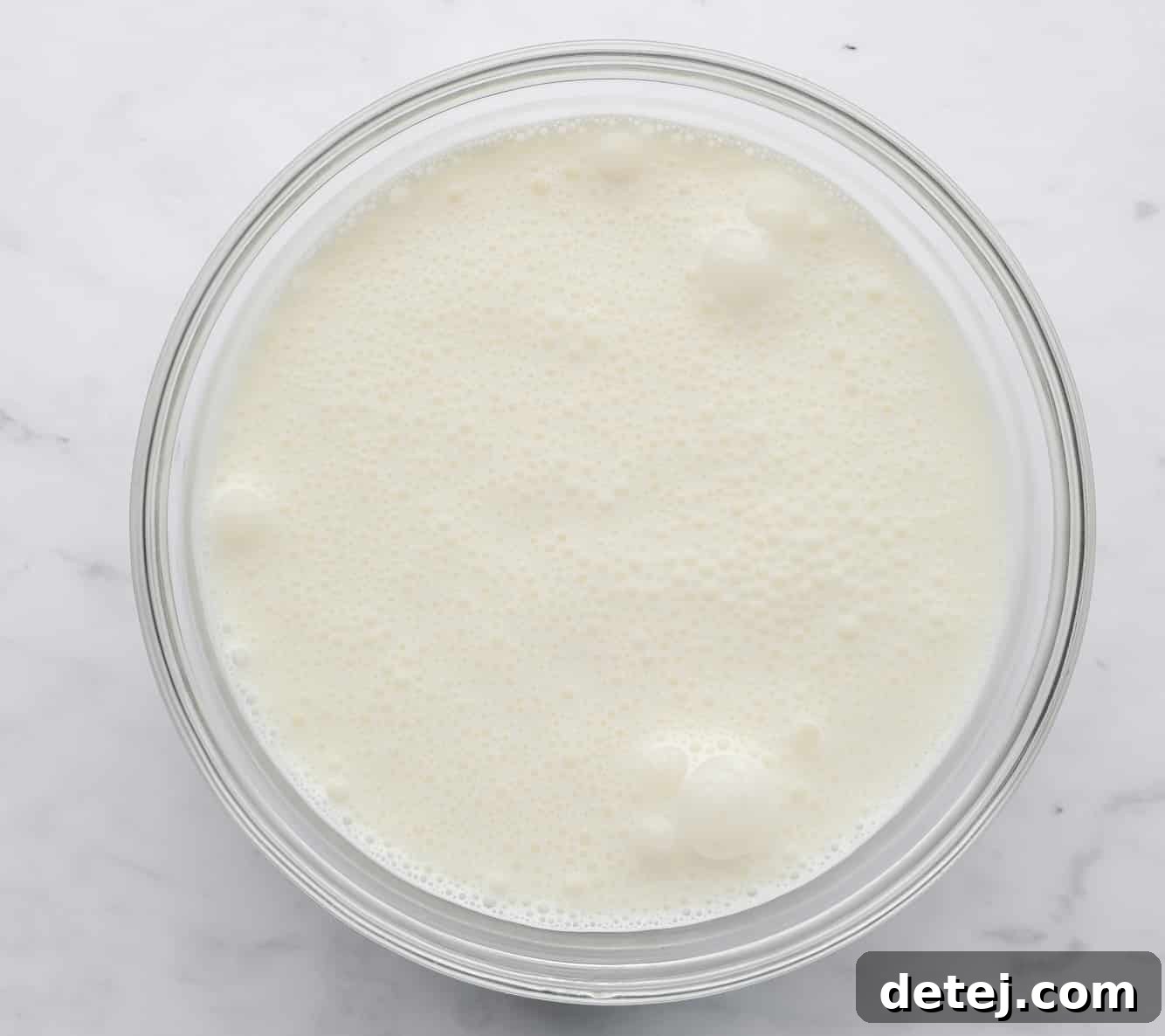 soy milk and coconut oil in a large glass bowl.