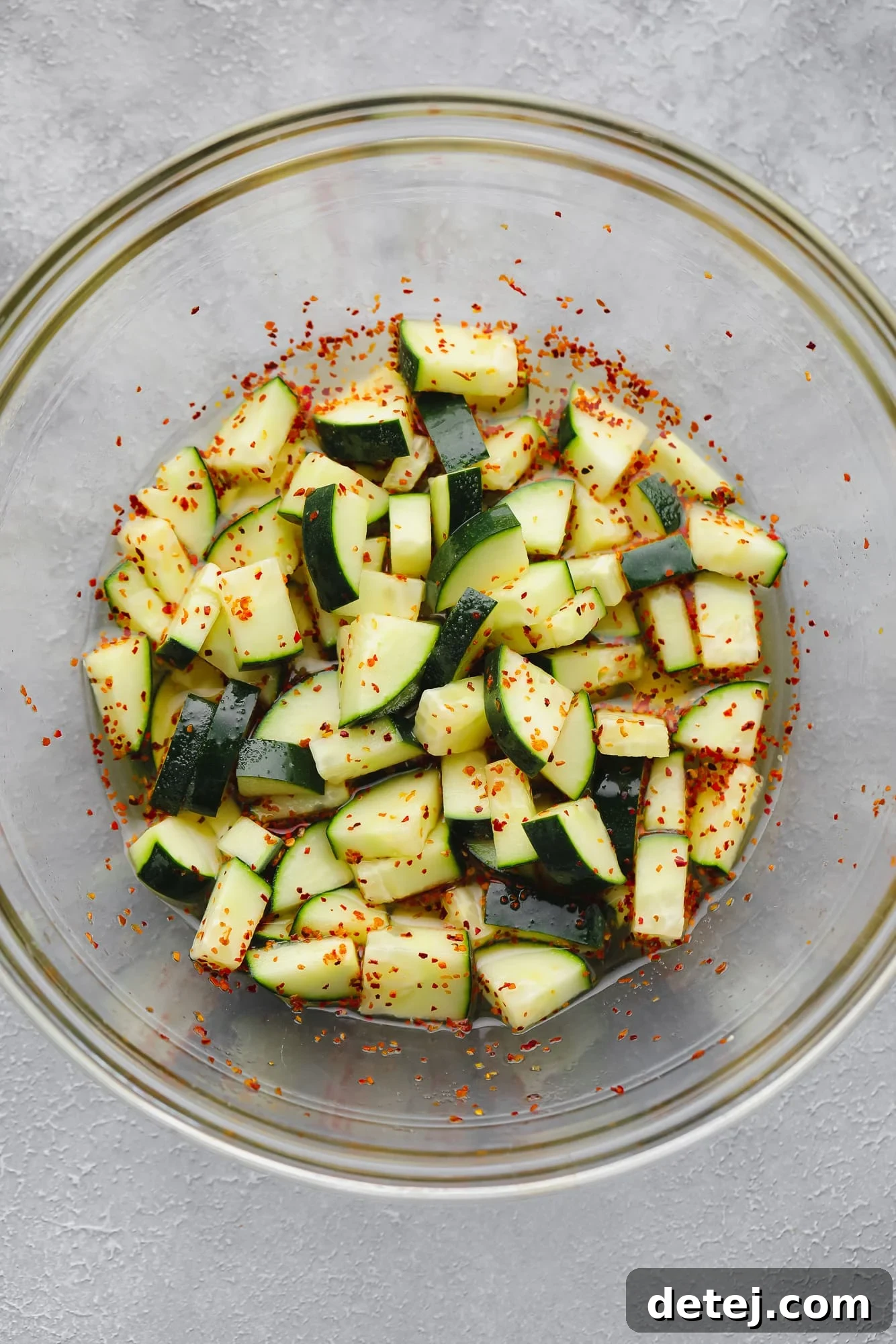 cucumber salad in a large glass bowl.
