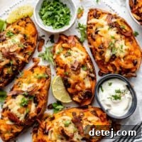 Flavorful healthy loaded sweet potato skins with vibrant toppings, perfect for a game day snack.