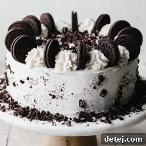 whole cake with oreos and white frosting on top