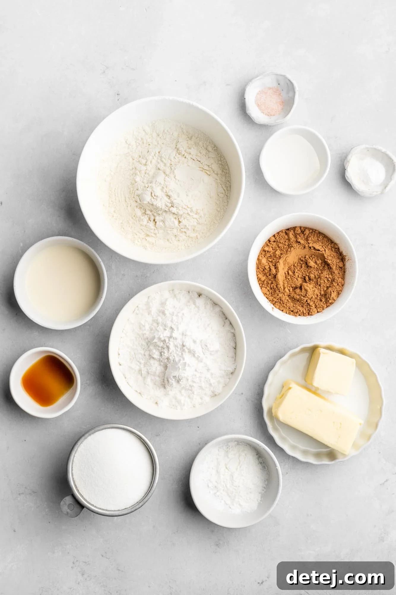 ingredients for Chocolate Sugar Cookies in individual white bowls.