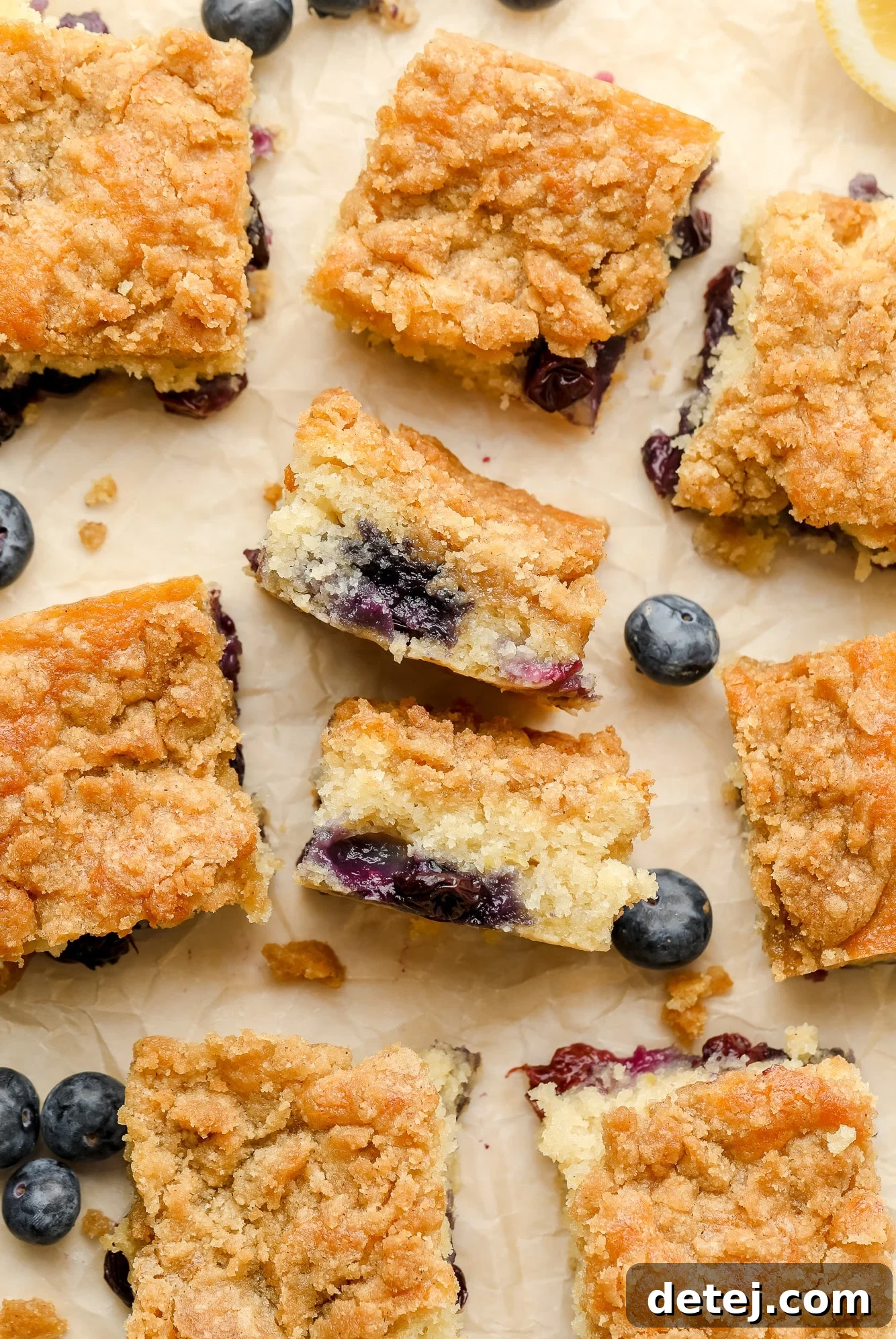 small slices of blueberry coffee cake turned on their sides.