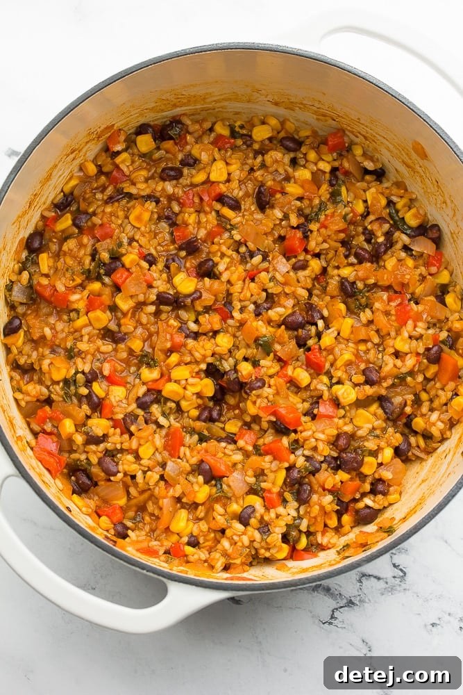 white pot with vegetarian burrito mixture in it, cooked