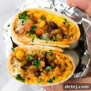 square image of vegan burrito wrapped in foil