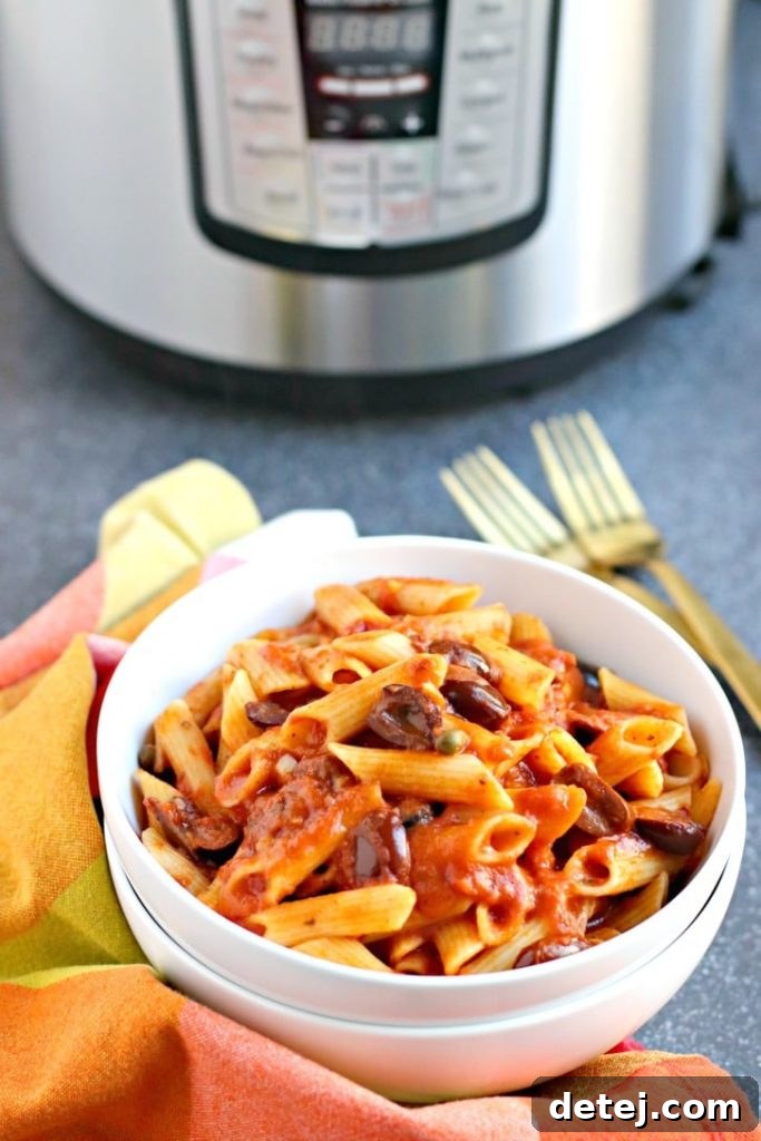 25 Effortless Vegetarian Instant Pot Creations 8 Instant Pot Pasta Puttanesca, a flavorful vegan pasta dish with olives, capers, and tomatoes