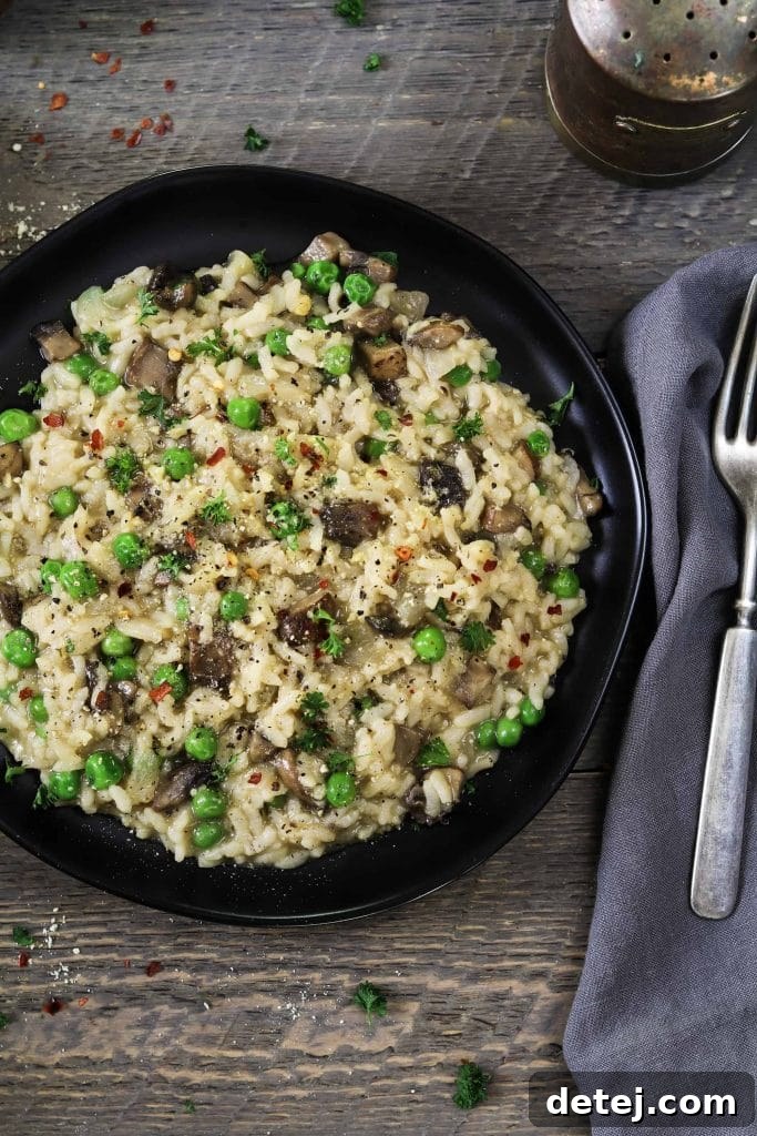 25 Effortless Vegetarian Instant Pot Creations 9 Creamy Instant Pot Mushroom Risotto, garnished with fresh herbs