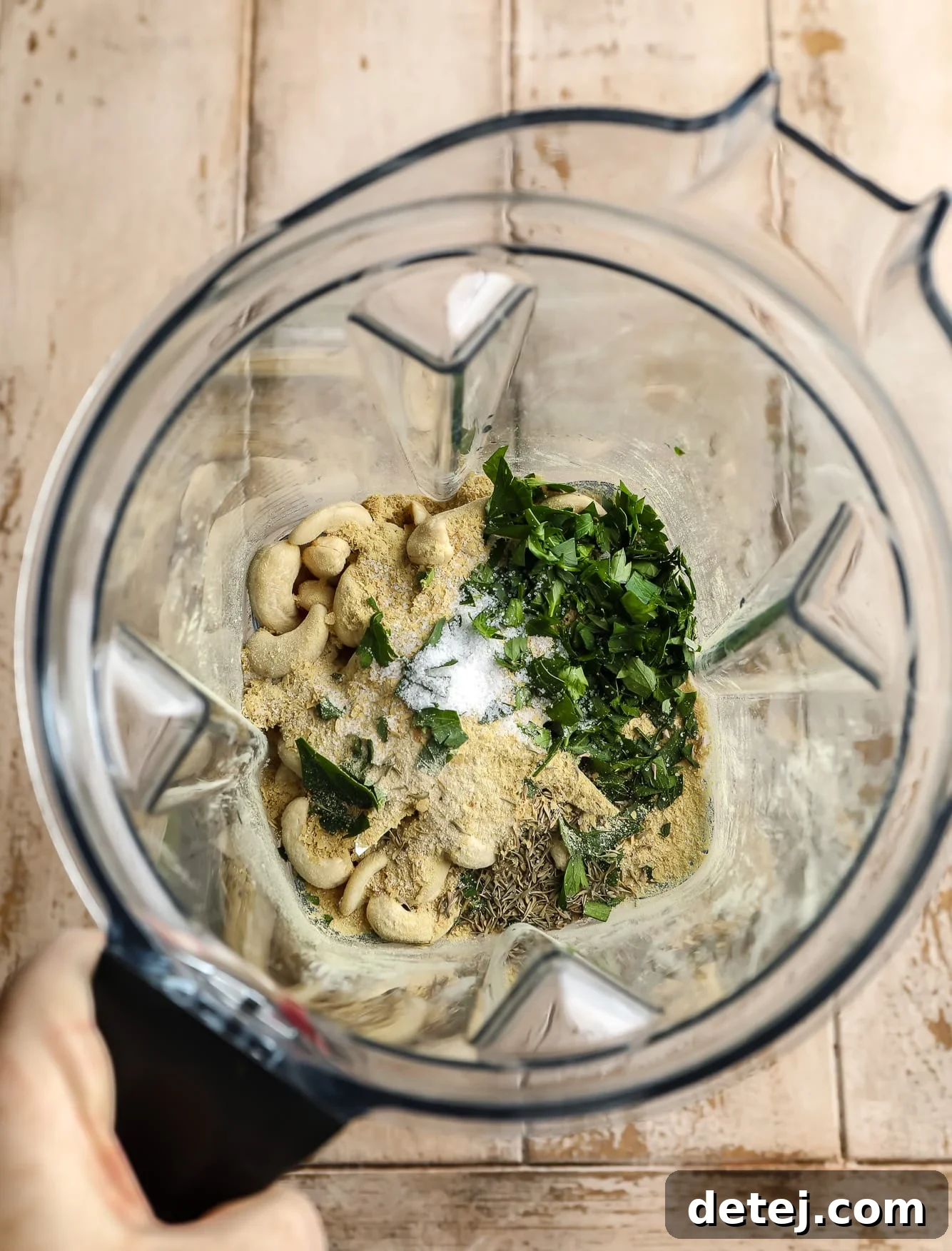 Savory Vegan Mushroom Delights 4 ingredients for stuffed mushroom filling in a blender.