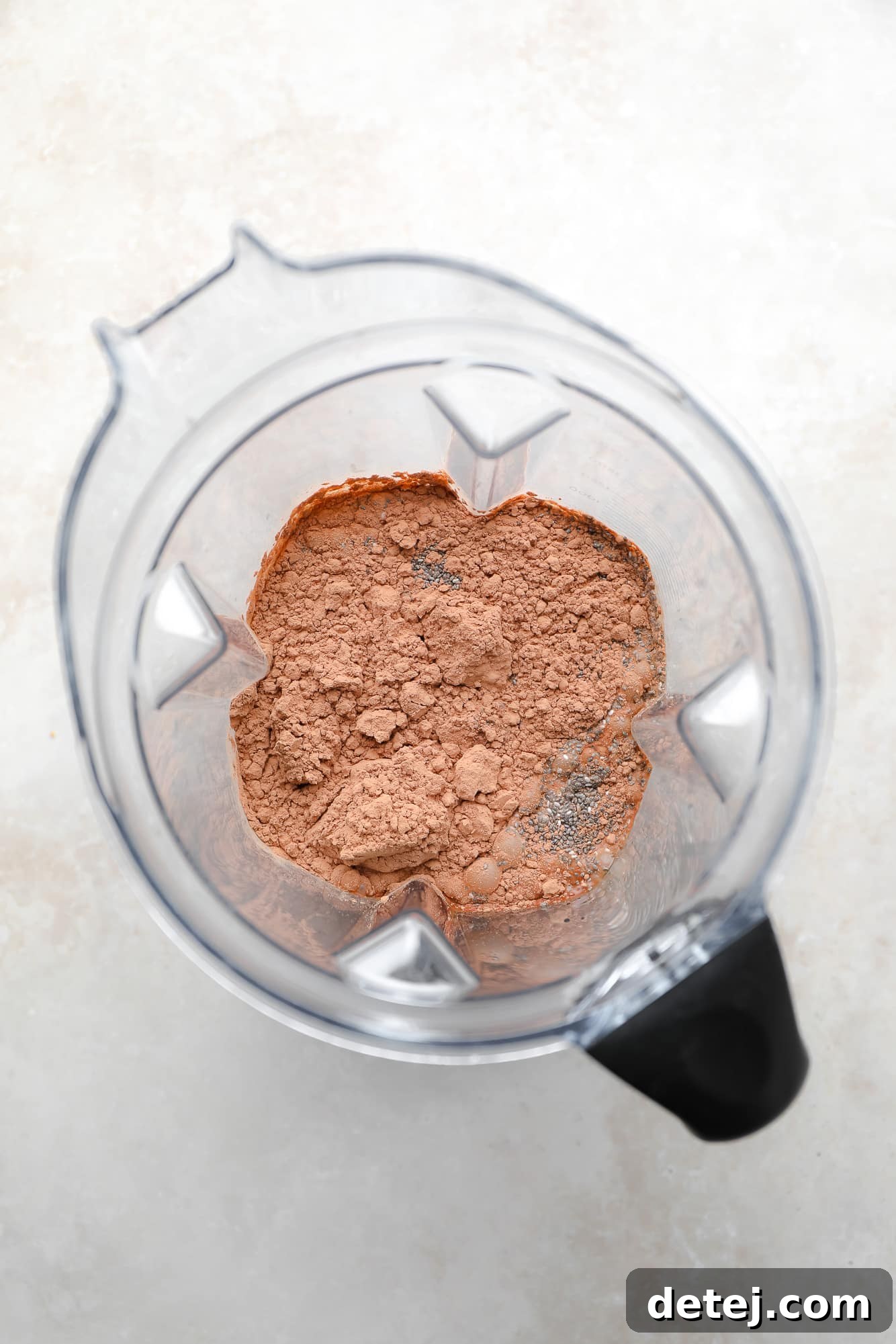 ingredients for chocolate chia pudding in a blender.