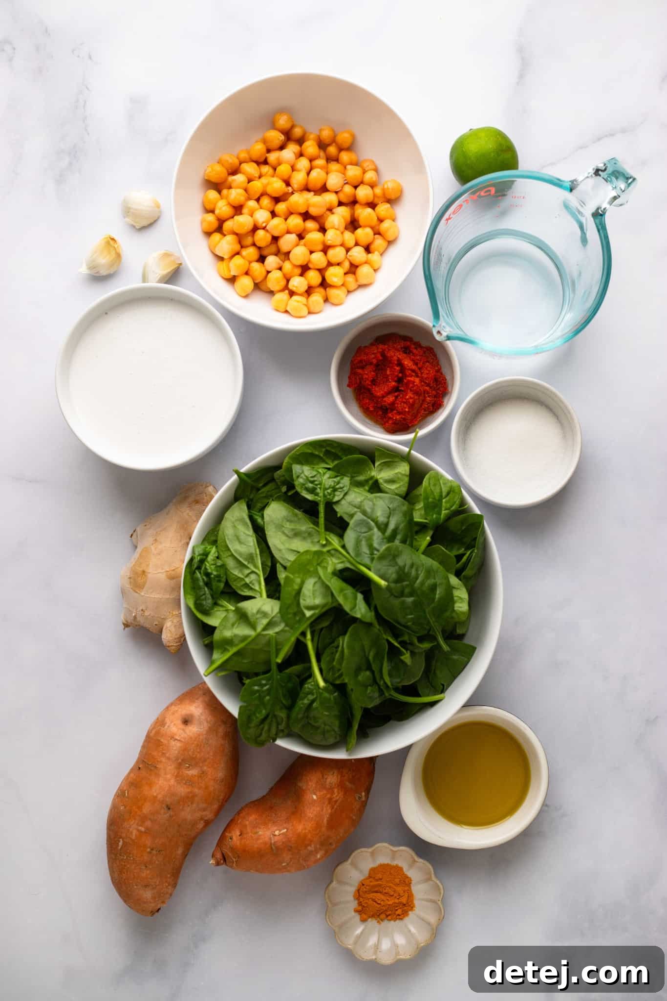 ingredients for Sweet Potato Curry with Chickpeas in individual white bowls.