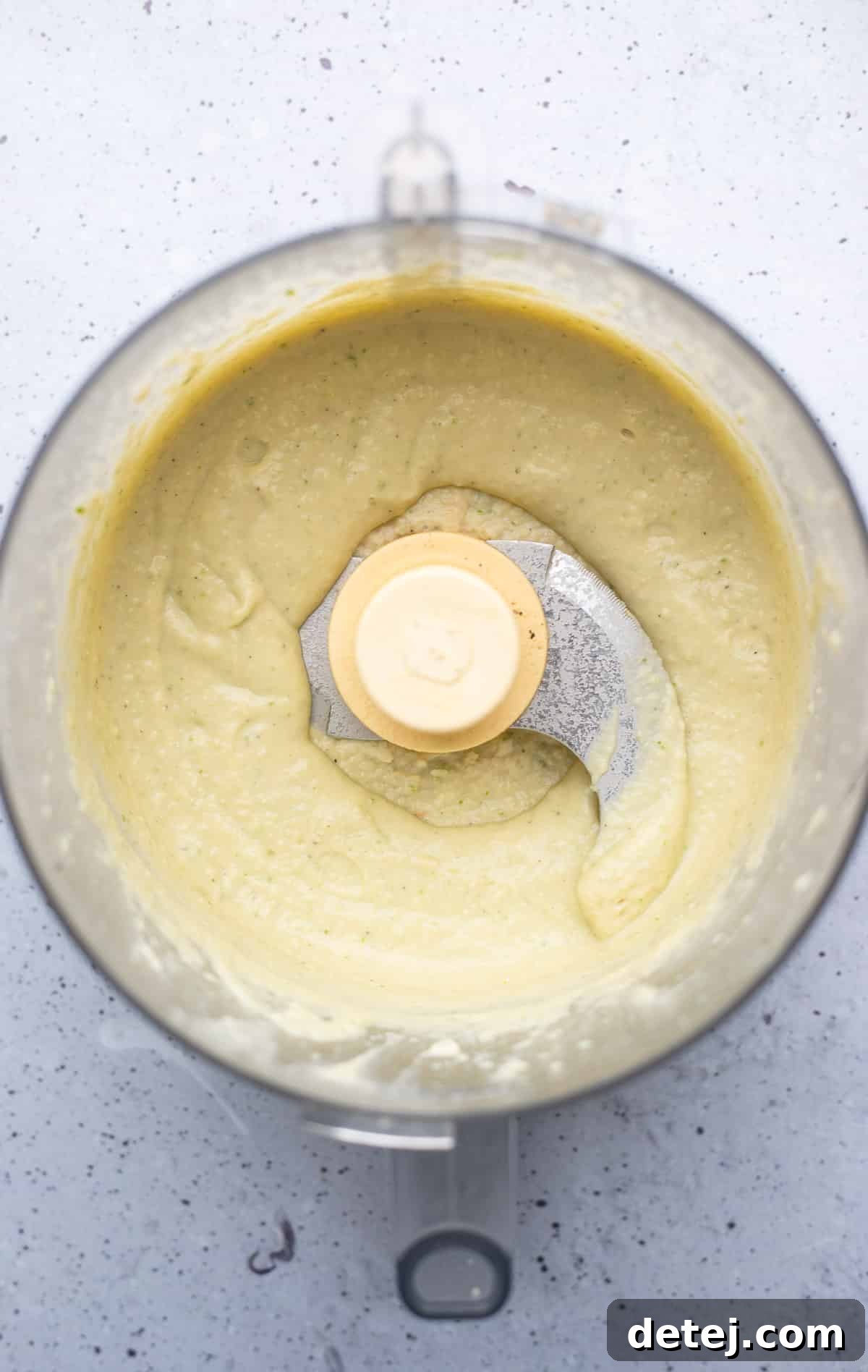 blended white bean dip in a food processor.