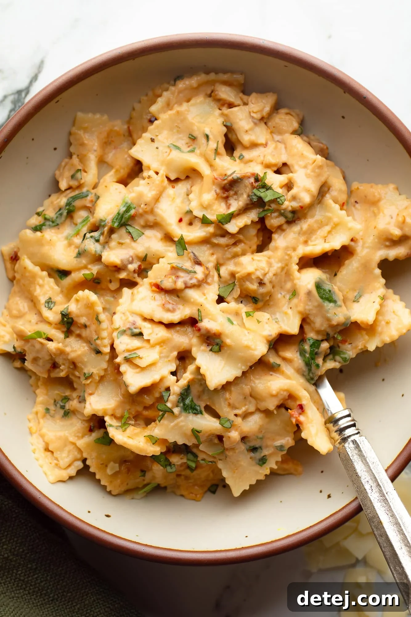 overhead view of vegan marry me pasta in a bowl.