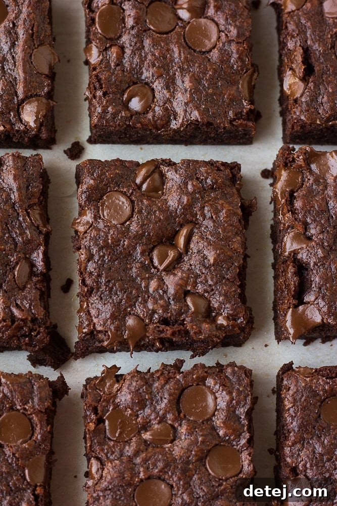 Many vegan brownies lined up - Homemade Vegan Brownies