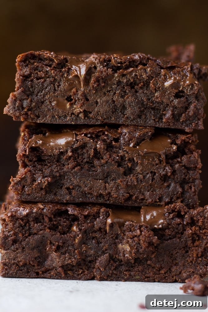 Close up 3 stacked vegan brownies
