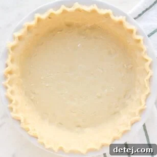 Finished vegan pie crust with fluted edges, not cooked