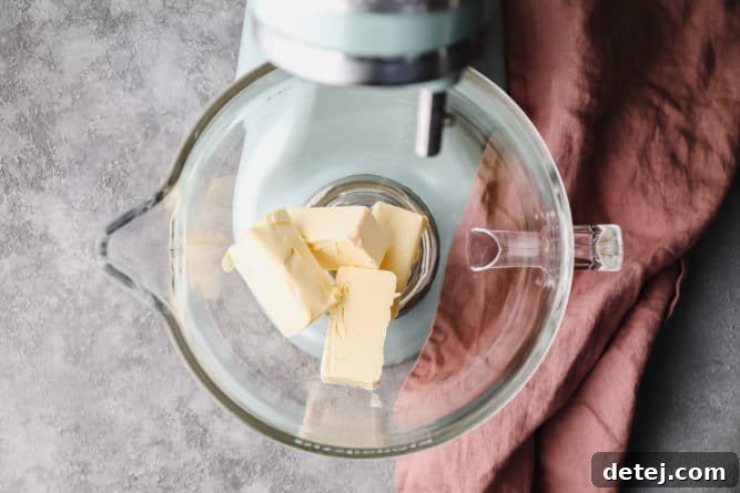 Dreamy Vegan Buttercream 4 Softened vegan butter in a glass mixing bowl, after being beaten until smooth and fluffy.