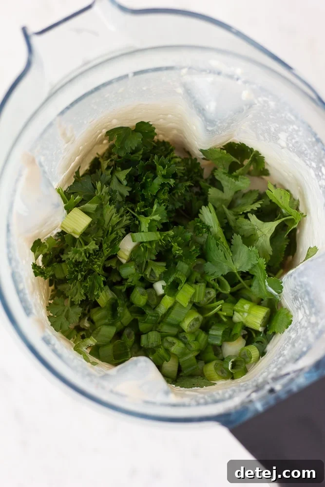 Luscious Vegan Green Goddess Dressing 6 Fresh cilantro, parsley, and green onions added to the creamy cashew base in a blender.
