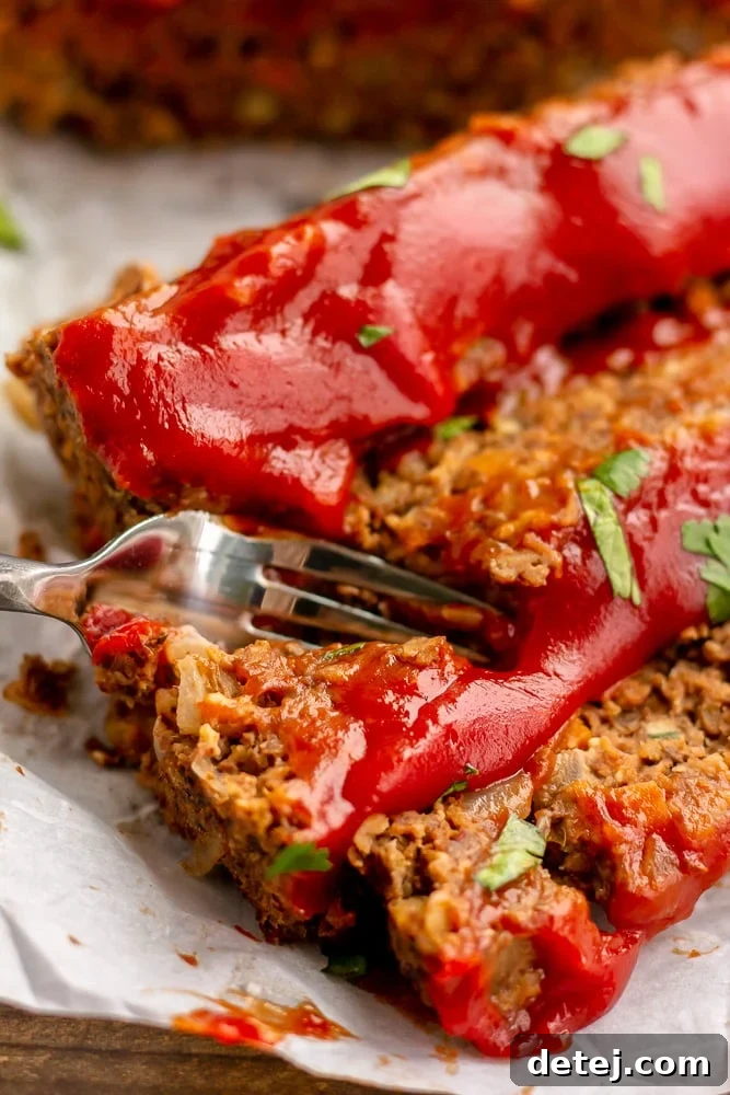fork cutting into a veggie meatloaf