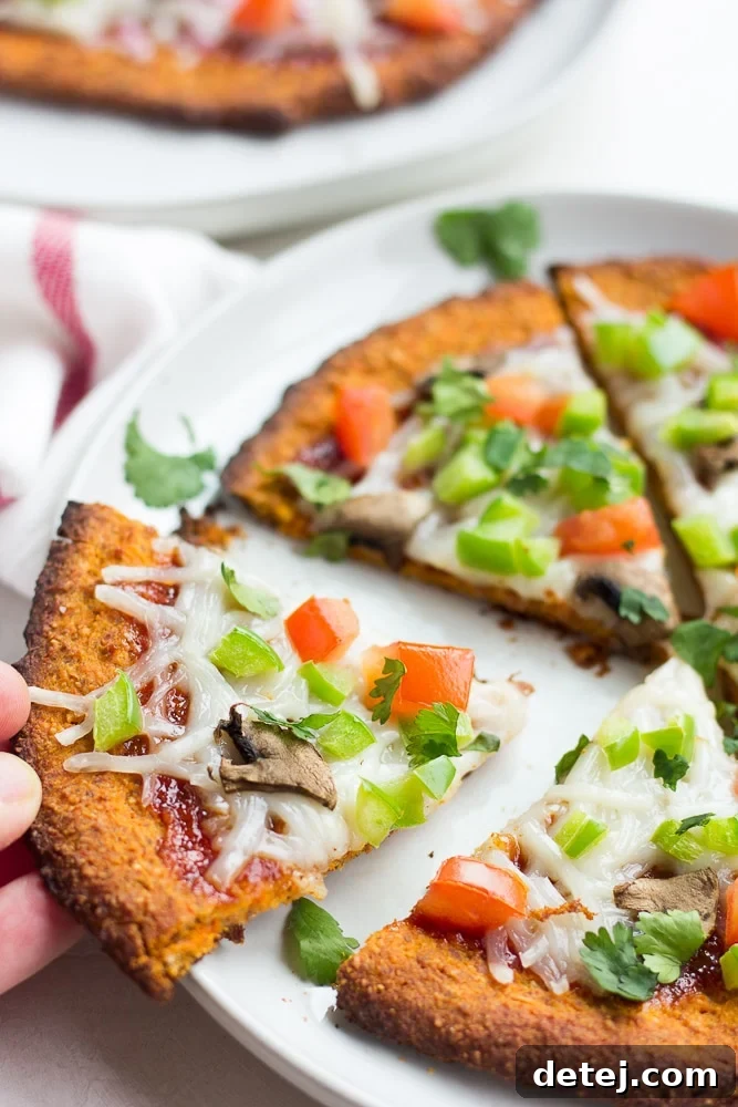 whole sweet potato pizza crust pizza on a plate.