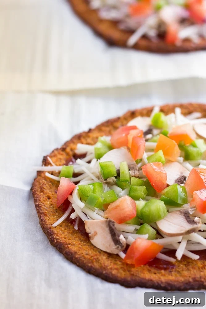 sweet potato pizza crust with toppings before being baked again.