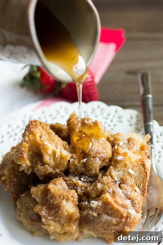 Ultimate Vegan French Toast Bake 2 A beautifully plated slice of Vegan French Toast Casserole drizzled with warm maple syrup, ready to be enjoyed.