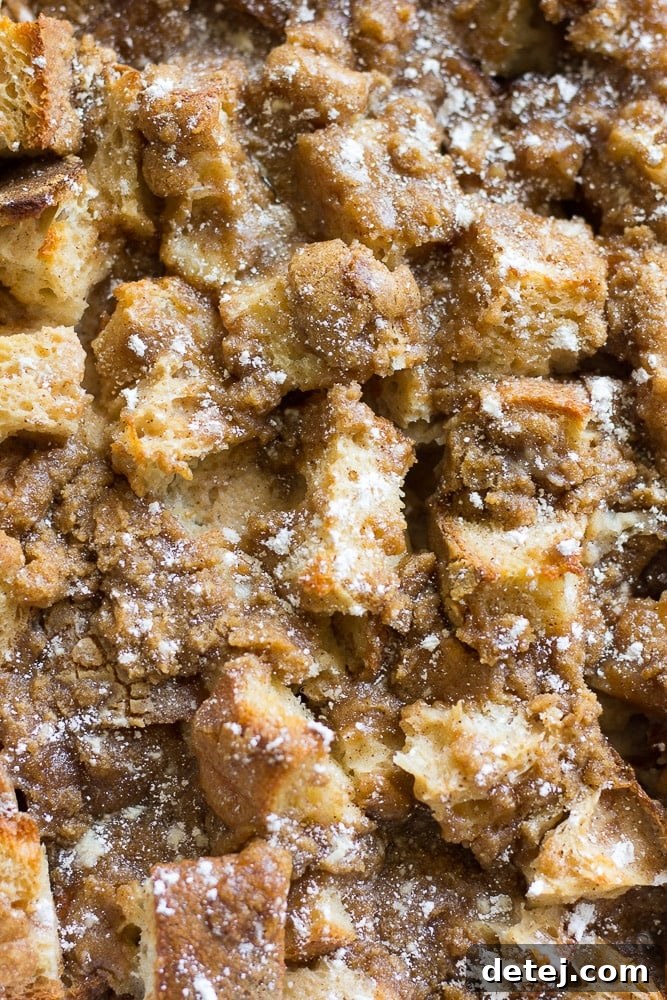 Ultimate Vegan French Toast Bake 5 An extreme close-up shot of the crunchy, golden-brown topping and custardy interior of a Vegan French Toast Casserole, highlighting its tempting texture.