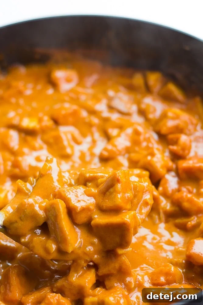 vegan butter chicken in a pan, cooked.