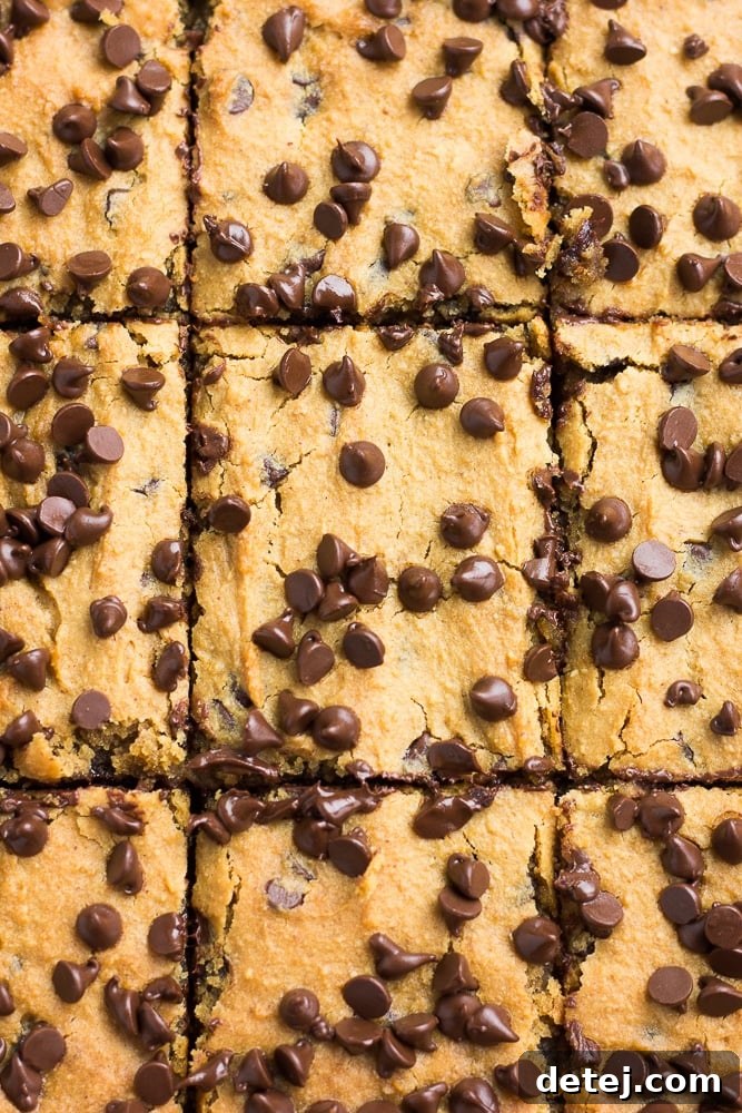 sliced chickpea blondies, looking down upon them in a pan