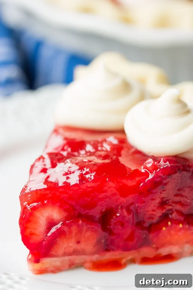 slice of strawberry pie on a white plate