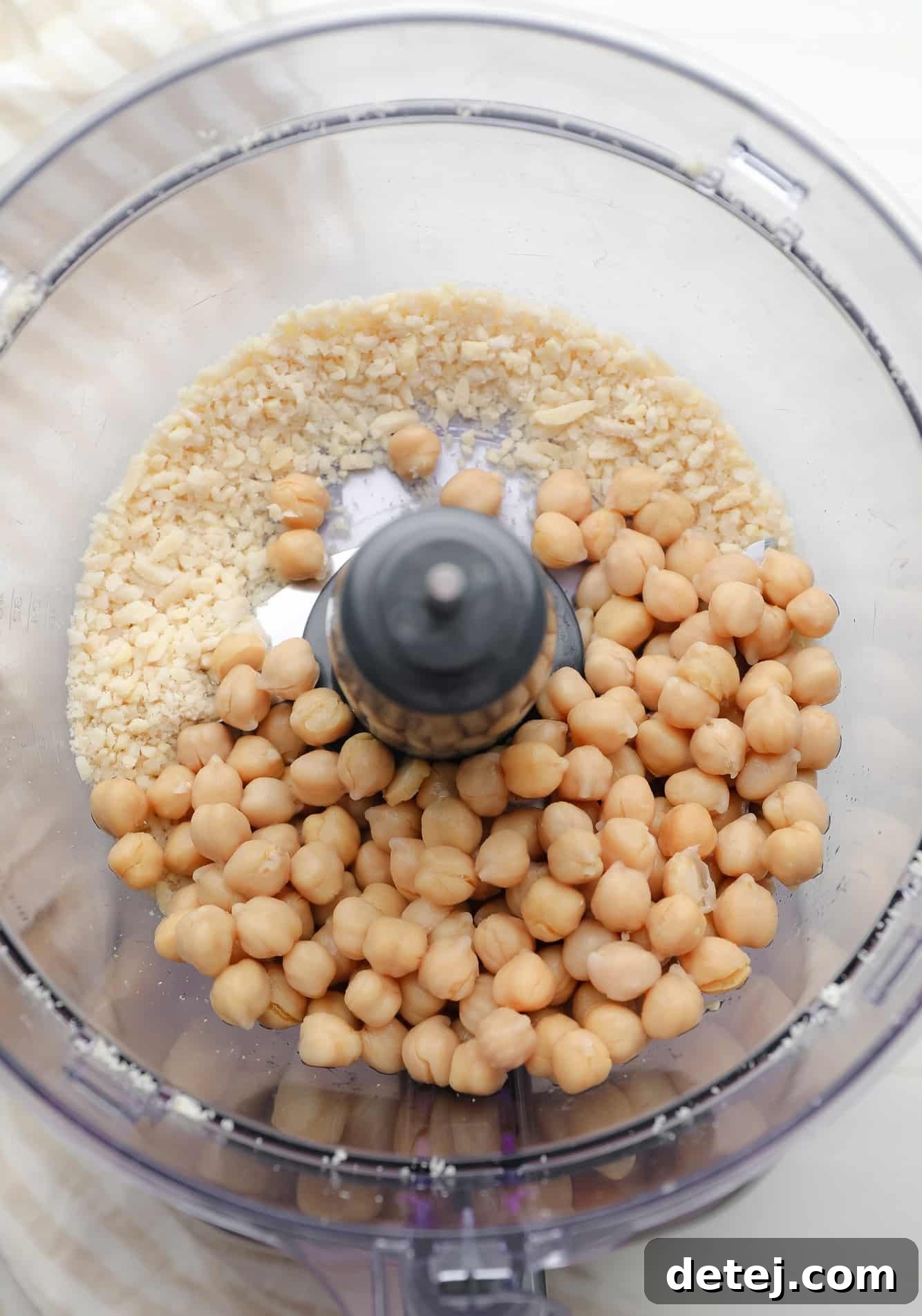 chickpeas and crushed almonds in a food processor.